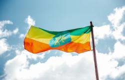 https://www.pexels.com/photo/national-colorful-flag-of-ethiopia-under-cloudy-sky-3794753/