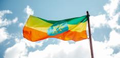 https://www.pexels.com/photo/national-colorful-flag-of-ethiopia-under-cloudy-sky-3794753/