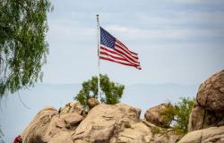 Photo by Get Lost Mike: https://www.pexels.com/photo/a-flag-on-a-rock-formation-9012267/ Photo by Get Lost Mike: https://www.pexels.com/photo/a-flag-on-a-rock-formation-9012267/