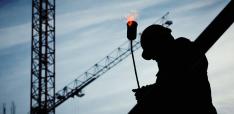 Global Labour Governance by Numbers: A Comparison of the ILO and OECD